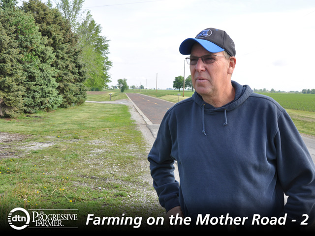 Illinois farmer Tim Seifert reflects how modern agriculture along Route 66 has to work around the limitations of the two-lane roadway. Parts of the road have been preserved while other areas have become dilapidated. A small, preserved brick section causes some controversy for locals. For instance, it&#039;s right along a main route where Seifert hauls grain to sell. (DTN photo by Chris Clayton)